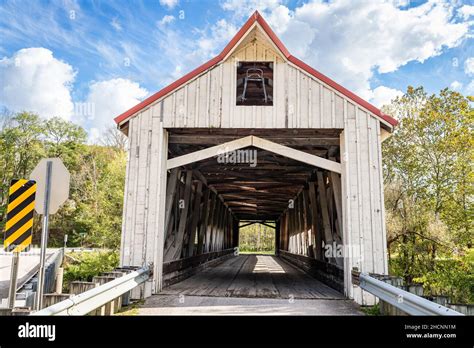 The Mechanicsville Covered Bridge Crosses Grand River During The Autumn