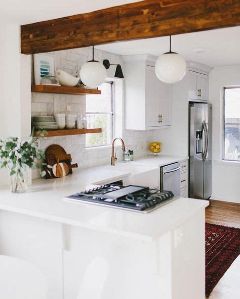 No matter where you are from in world, or what language you speak, one thing that will bring people together is food. Clean L-Shaped kitchen design - White with wooden features ...