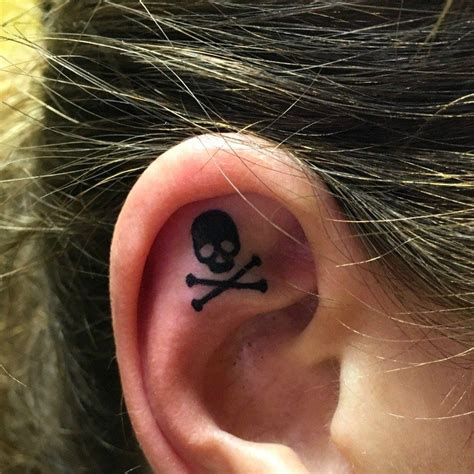 18 Tiny Tattoos That Are Prettier Than Any Piercing Tiny Skull Tattoos Inner Ear Tattoo
