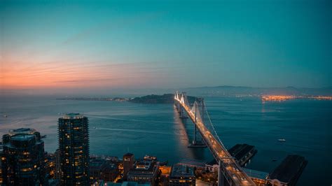 San Franciscooakland Bay Bridge At Dusk Wallpaper Backiee