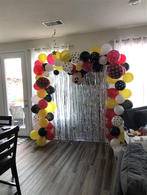 A Room Decorated With Balloons And Streamers