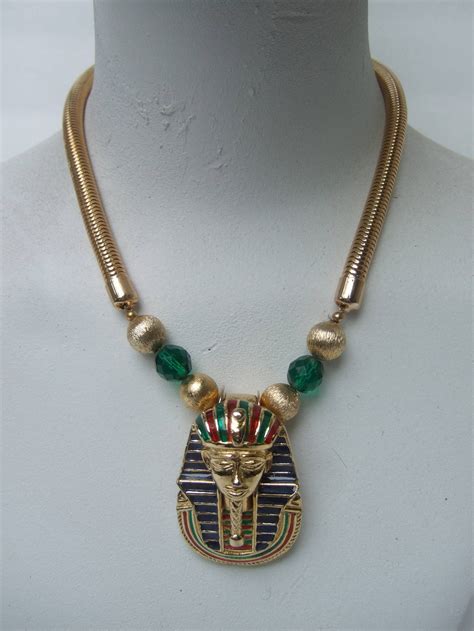 While there are a few standard necklace lengths, you should factor in your own measurements and similar factors when determining. Egyptian Style Gilt Enamel Pharaoh Choker Necklace at 1stdibs
