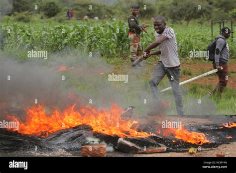 Harare Zimbabwe 15th Jan 2019 A Protester Burns Tires In A Highway From Harare To Bulawayo