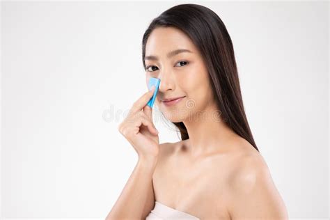 Beautiful Attractive Asian Woman Using Facial Oil Clean Film To Removal Oily On Face For Face