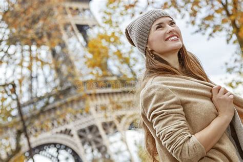 Happy Tourist Woman In Paris France Looking Into Distance Stock Photo