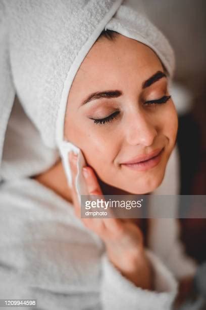Woman Removing Robe Photos And Premium High Res Pictures Getty Images