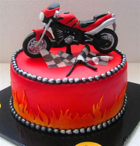 For a man who once had his bike airbrushed but sold it and regretted not having it, so his daughter wanted to recreate it, but on a budget, hence the bike emerging from an 8 cake riding out the design. DECORATING DESIGN IDEA ~ Motorcycle Cake | Motorcycle ...
