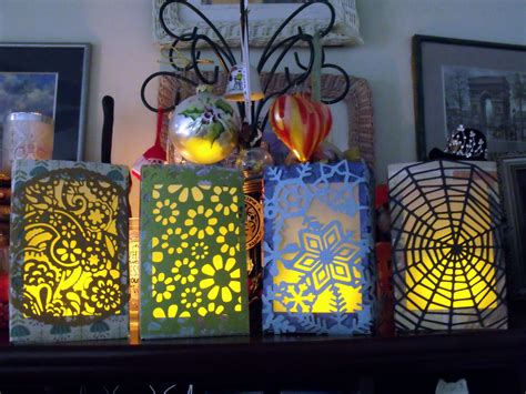 Decorative Paper Lanterns Sitting On Top Of A Shelf