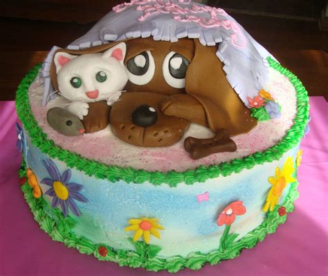 The birthday cake design can be anything. Dog And Kitty Flower Birthday Cake - CakeCentral.com