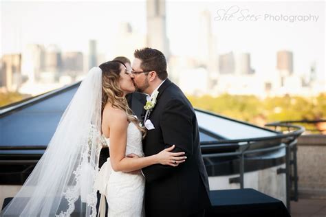 Bride And Groom Kiss Chicago Rooftop Ceremony Chicago Skyline