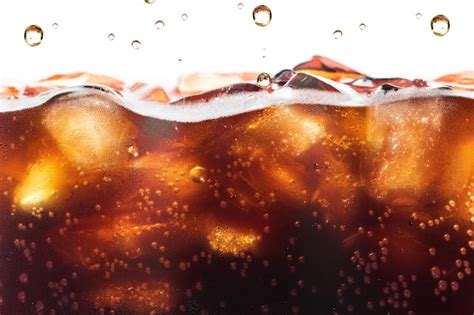 Cola Splashing With Soda Bubble Soft Drink Or Refreshment Photo