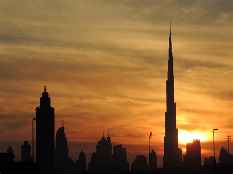 Dubai Skyline Under The Setting Sun In United Arab Emirates Uae Image
