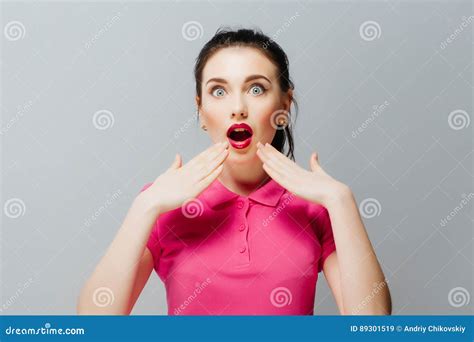 Surprised Funny Teenage Girl Showing Empty Copy Space With Her Finger