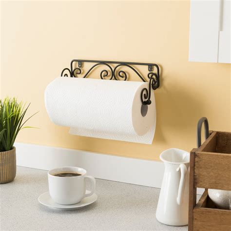 A Cup Of Coffee Sits Next To A Roll Of Toilet Paper On A Wall Rack