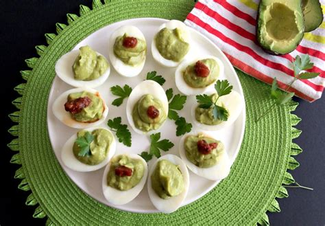 Make sure the yolks are completely mashed and all the ingredients are. Avocado Deviled Eggs {GF, Low Cal, Paleo} - Skinny ...