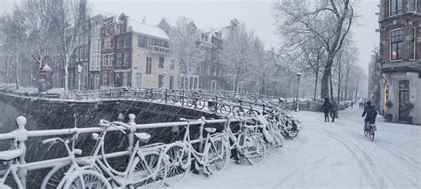 Snow In Amsterdam Does Not Keep The Dutch From Riding Thei Flickr