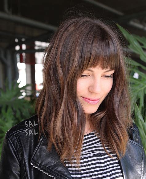 The best haircuts for women in 2021. Layered Brunette A-Line Lob with Fringe Bangs and Highlights - The Latest Hairstyles for Men and ...