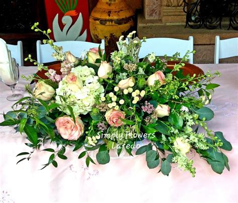 We would like to show you a description here but the site won't allow us. Table Center Piece Simply Flowers, Laredo TX | Flower ...