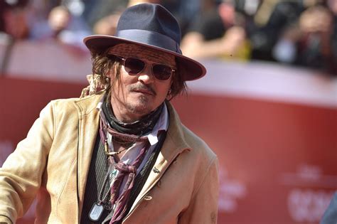 Photo Johnny Depp Arrive à La Première De Puffins Lors De La 16ème édition Du Festival Du Film