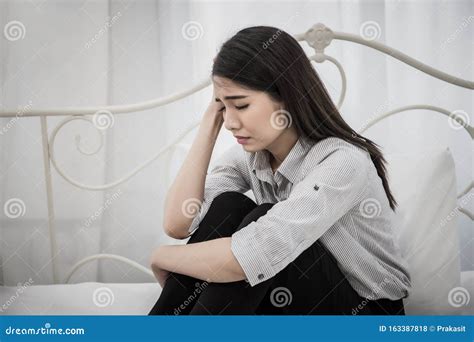 Depressed Woman Sitting Crying On Her Bed Stock Photo Image Of House