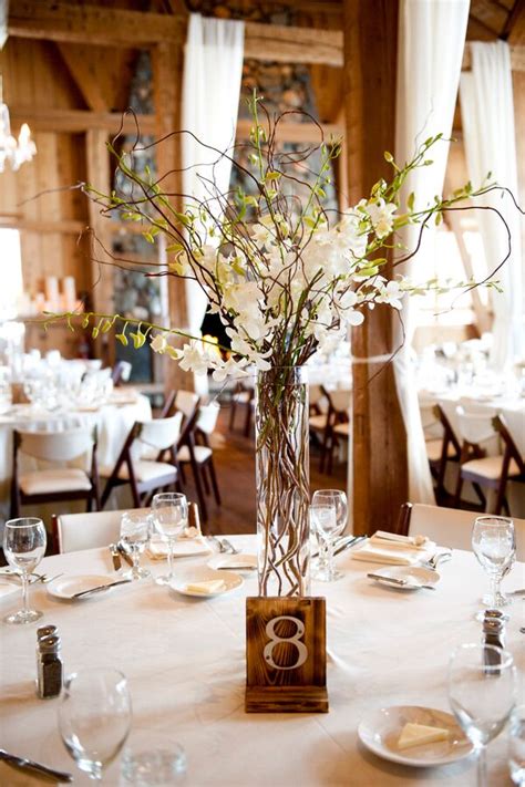 Floating Candle And Willow Branch Centerpieces