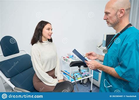 Woman Undergoing A Medical Examination By A Gynecologist At Clinic Stock Image Image Of