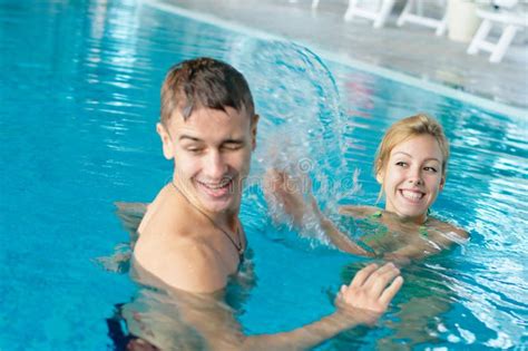 Teen Couple Splashing At The Pool Royalty Free Stock Image Image 20844276