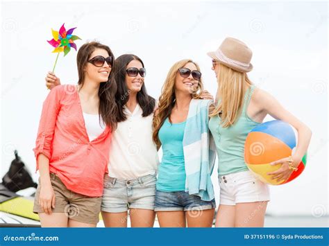 Smiling Girls In Shades Having Fun On The Beach Stock Photo Image Of Resting Resort
