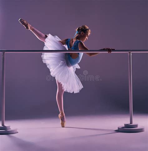 Classic Ballerina Posing At Ballet Barre Stock Photo Image Of