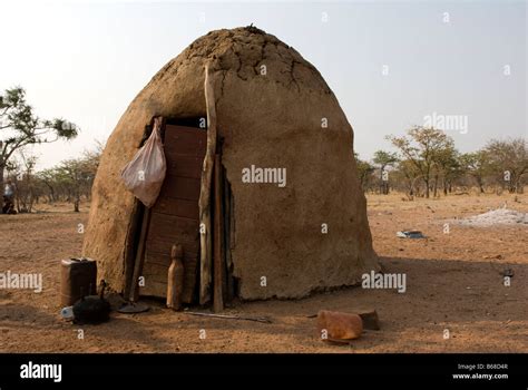Traditional Village Huts Built From Mud And Dung At The Himba Oase