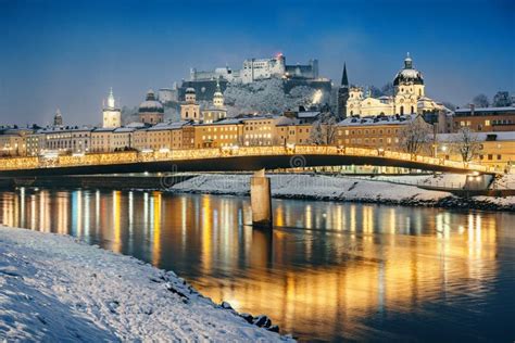 Historic City Of Salzburg With Salzach River In Winter During At Night