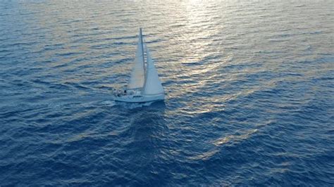 Aerial View Yacht Sailing On Opened Sea Sailing Boat Yacht From Above