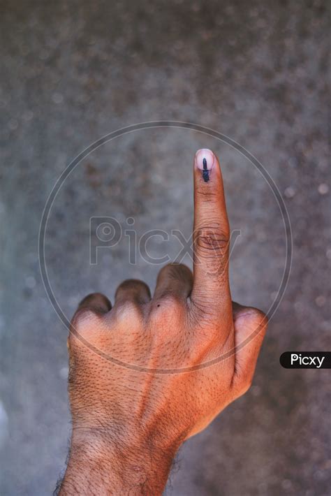 Image Of Voter Showing Inked Finger After Casting Vote In Elections