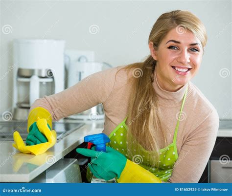 Blonde Maid Cleaning In Kitchen Stock Image Image Of Blonde