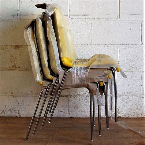 Stack chairs 4 less offers the widest selection of in stock stacking chairs at the lowest prices nationwide. FROVI Zero Upholstered Stacking Chair Yellow Vinyl 1083