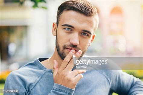 Young Handsome Male Smoking High Res Stock Photo Getty Images