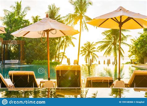 Beautiful Outdoor Tropical Nature Landscape Of Swimming Pool In Hotel