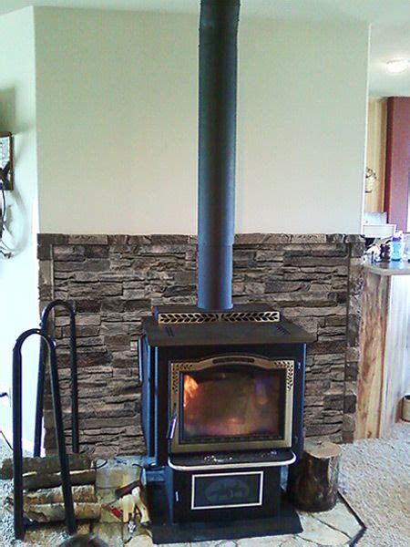 A Faux Stone Accent Wall Makes A Great Finishing Touch Behind Cast Iron