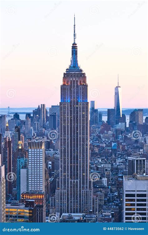 Cityscape View Of Manhattan With Empire State Building At Sunset
