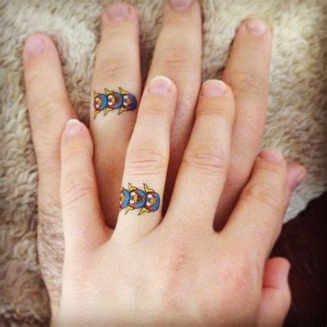Though ring finger tattoo designs for couples are the most searched couple tattoos designs, still, they are not the only ones. 35 Sweet & Simple Wedding Band Tattoos | Wedding band ...