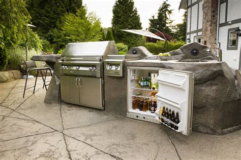Custom Outdoor Kitchen With Built In Barbeque Refrigerator And Sink