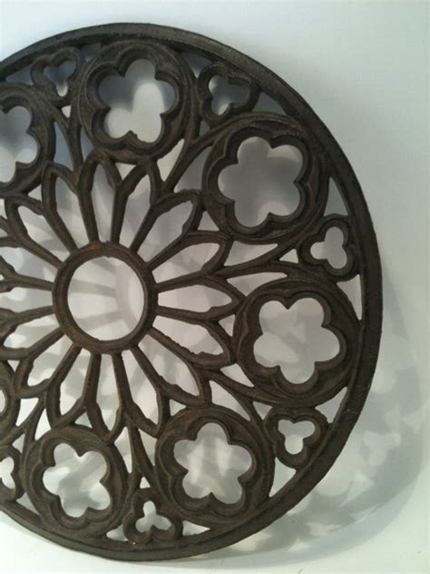 We offer a unique custom hand forged wrought iron grills that can be installed and attached to the ceiling or vertical panels. Industrial Chic Medallion Wall Hanging Cast by ...