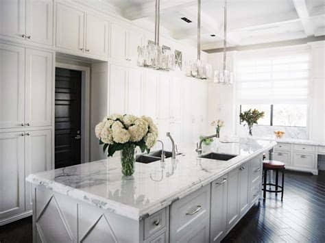 An open style kitchen is ideal for those who desire a fluid living space between the kitchen and living room or dining areas. Kitchen Remodels With White Cabinets Pictures | Roy Home ...