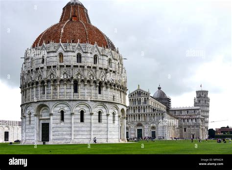 The Pisa Baptistery The Pisa Cathedral And The Tower Of Pisa Located