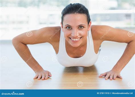 Smiling Beautiful Woman Doing Push Ups In Gym Stock Photo Image Of