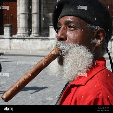 Cuban Man Smoking A Cigar Photograph By Lucas Guardincerri