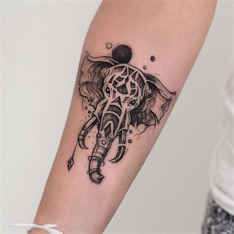 An Elephant Tattoo On The Right Arm