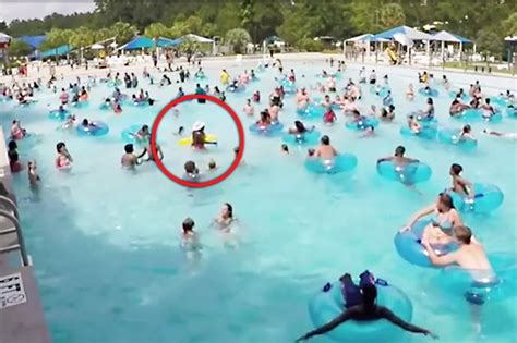 Watch Hero Lifeguard Leaps Into Wave Pool To Save Girl From Drowning Daily Star