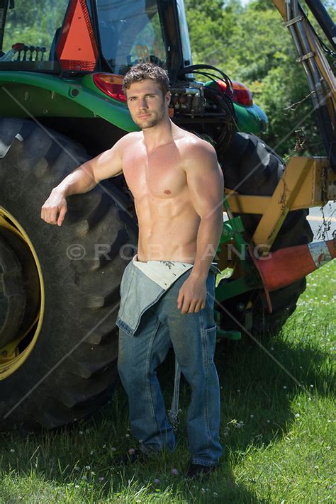 Good Looking Shirtless Farmer In Overalls By A Tractor Rob Lang