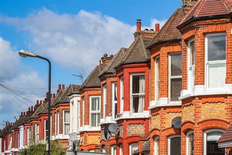 A Row Of Typical Red Brick British Terraced Houses In London Labm